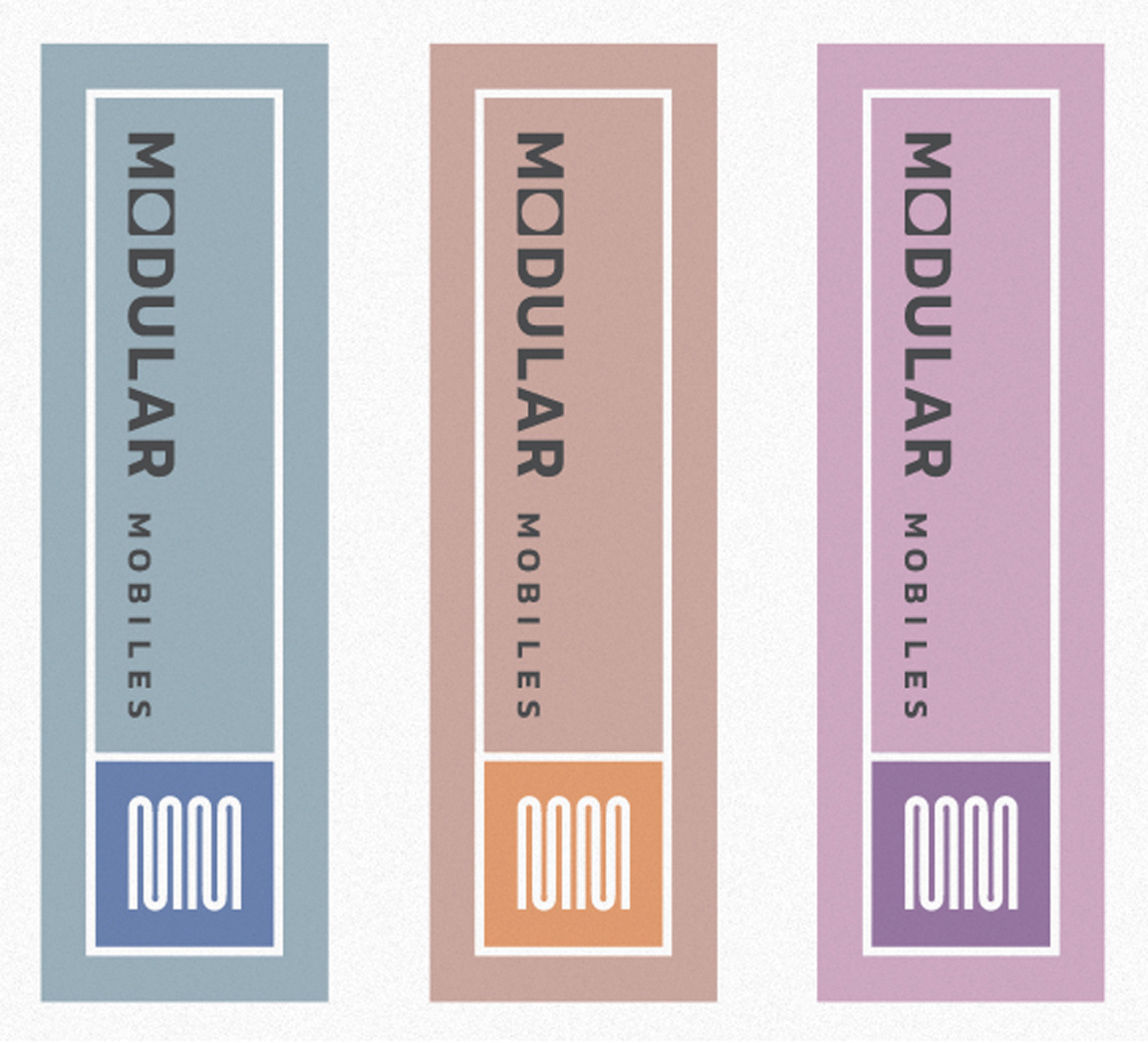 Three Modular Mobiles branded  tags in various colors
