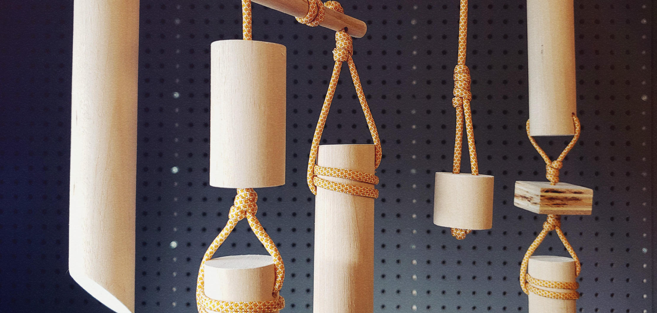 Picture of hanging mobile made of wooden dowels and paracord